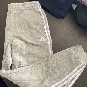 Adidas sweatpants.